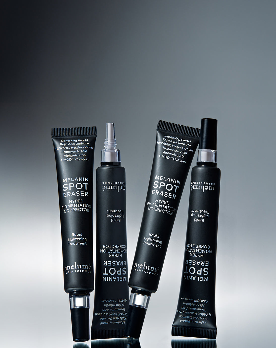 Four black skincare products with white text on a gray background mobile