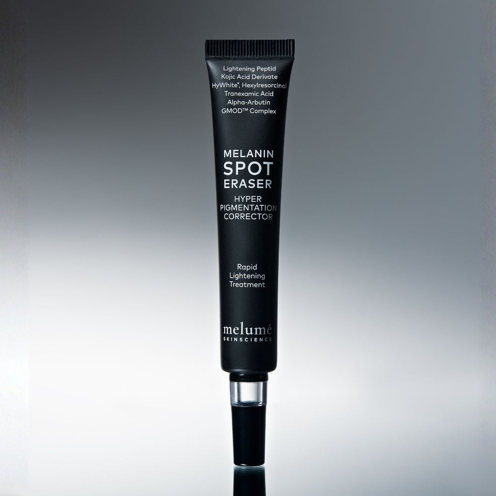 Melanin Spot Eraser tube on a gray background