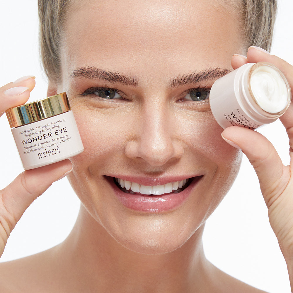 image mood model posing with two wonder eyes next to her face